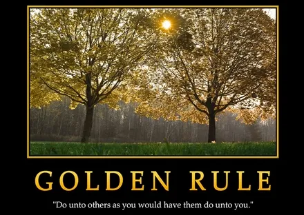 A poster headed “Golden Rule”, showing two autumn trees above the words “Do unto others as you would have them do unto you.”
